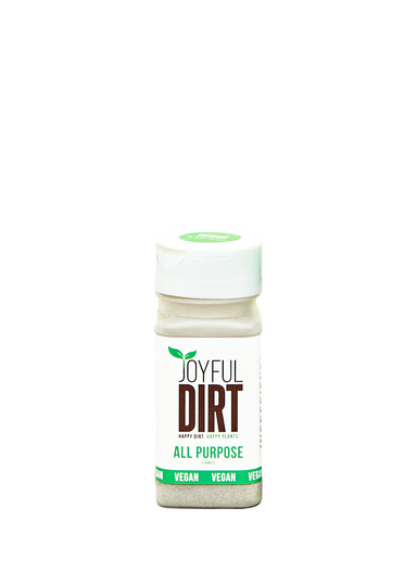 Joyful Dirt Fertilizer Shaker with a white background