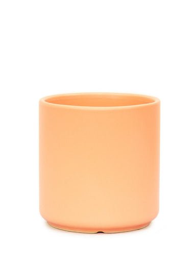 7" Wide Peach Cylindrical Ceramic Planter with a white background